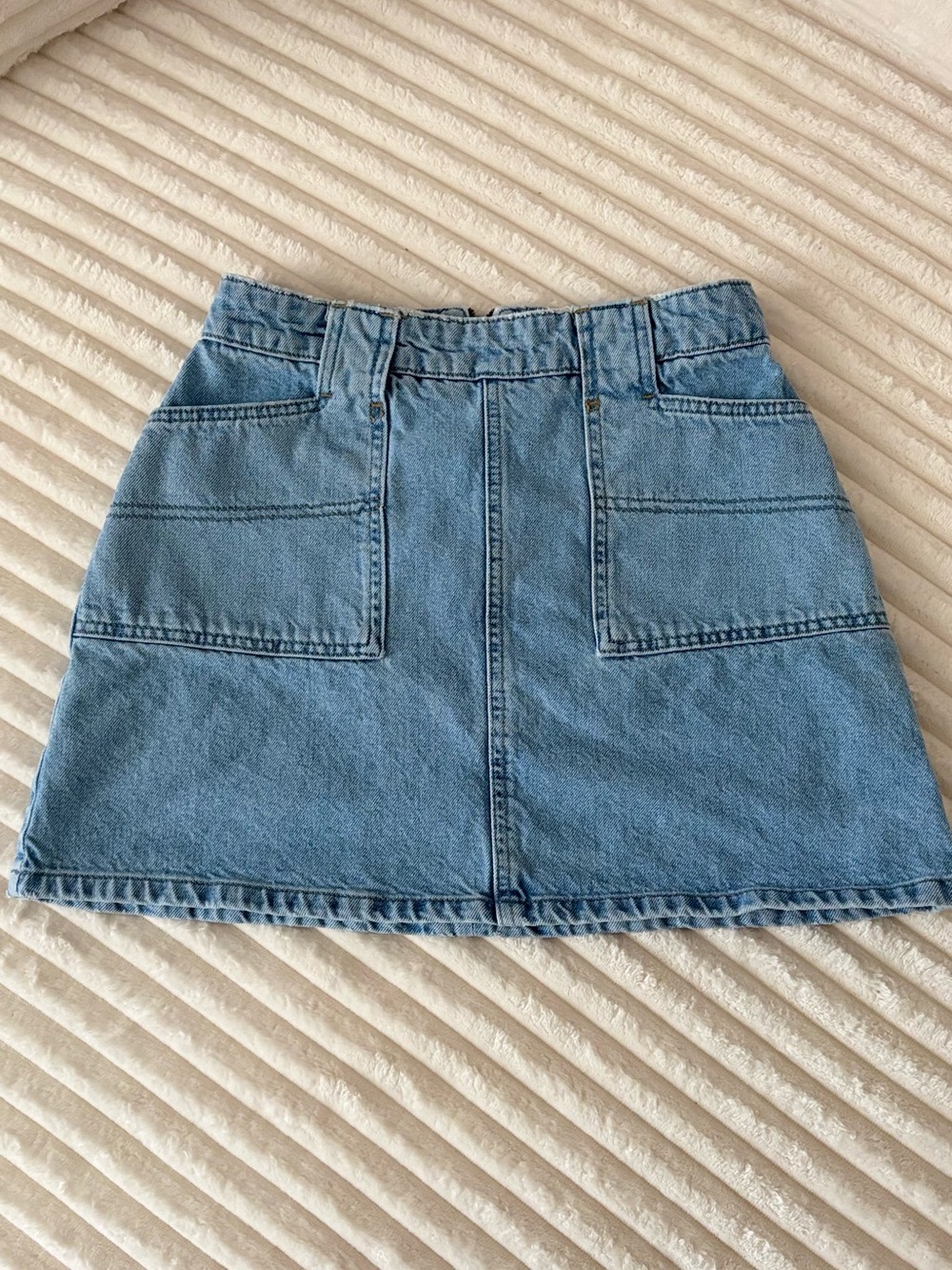 Light Wash Denim Mini Skirt with Front Patch Pockets
